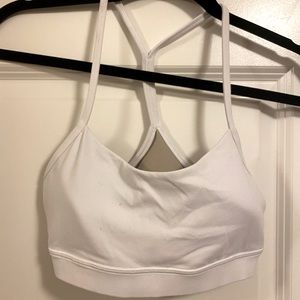 Gently worn Lululemon Sports Bra. size 4. White with Tan lining
